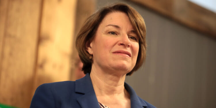 Sen. Klobuchar seeks sympathy for retired 61-year-old with six figure income who will have to vacation less if temporary taxpayer subsidies expire
