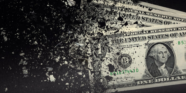 Dollars dissolving against a background; Kansas has a spending problem not a revenue problem.