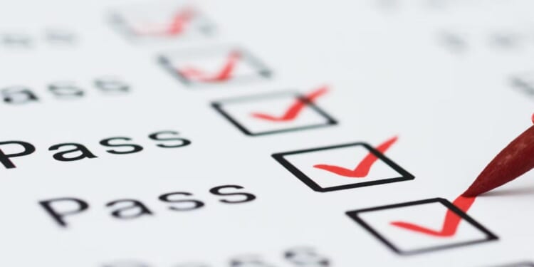 When grades and test scores conflict, what should parents rely on?