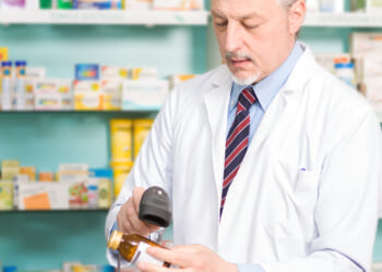Portrait,Of,An,Handsome,Pharmacist,At,Work