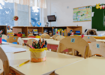 An empty classroom with materials but no students.