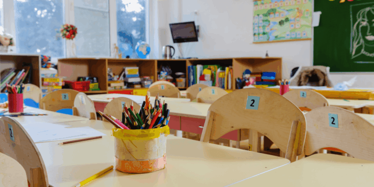 An empty classroom with materials but no students.